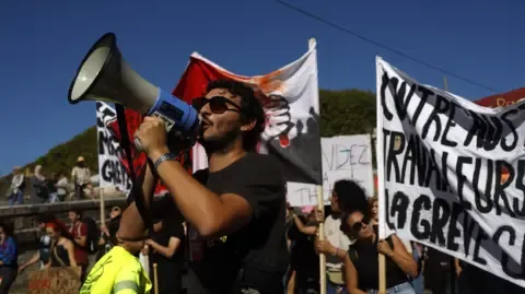 Nationwide Strikes Begin Opposing Budget Slashing
